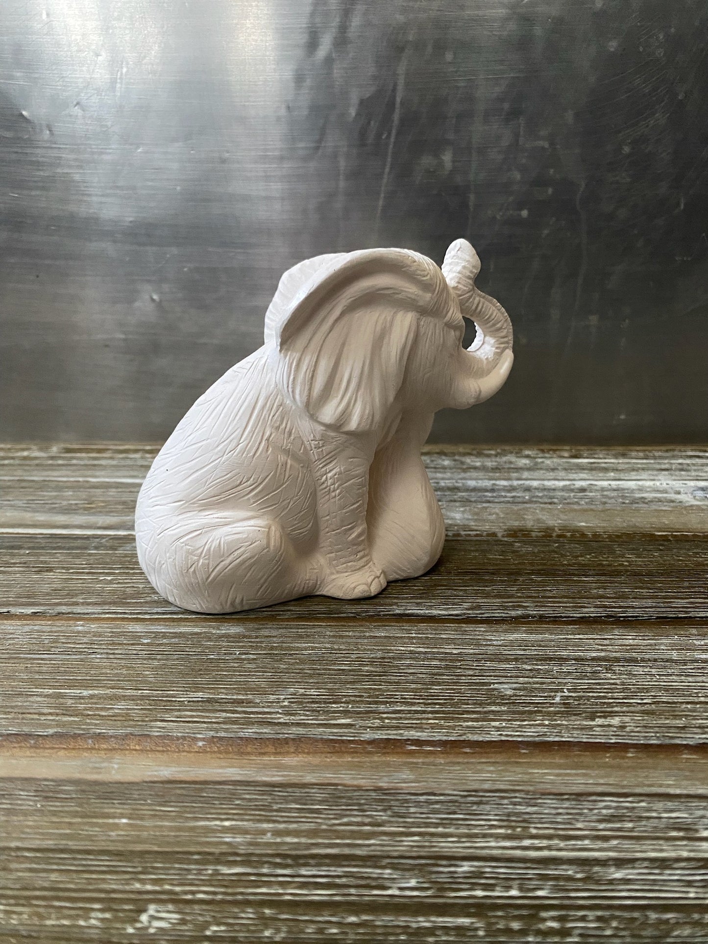 Small Nurturing Elephant BIsque